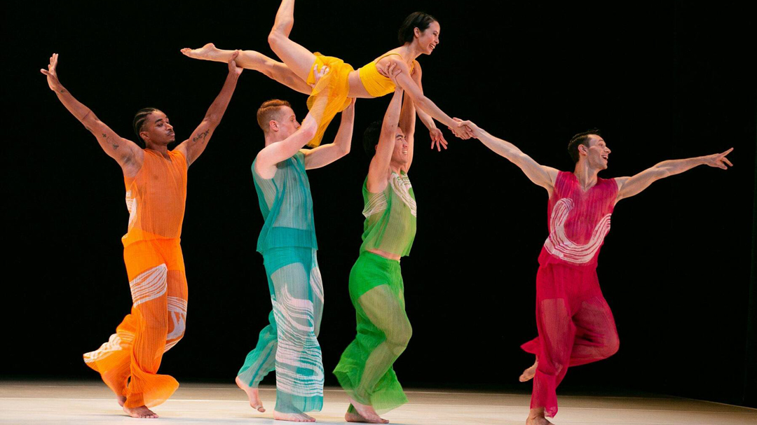 dancers in colorful outfits performing at Detroit Opera