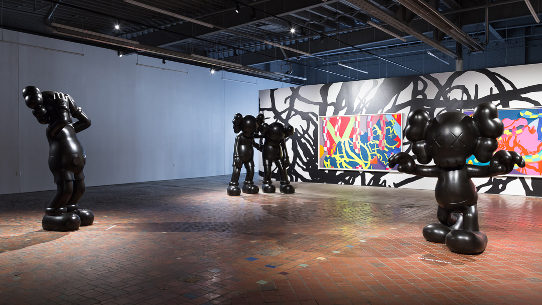 KAWS sculptures inside MOCAD